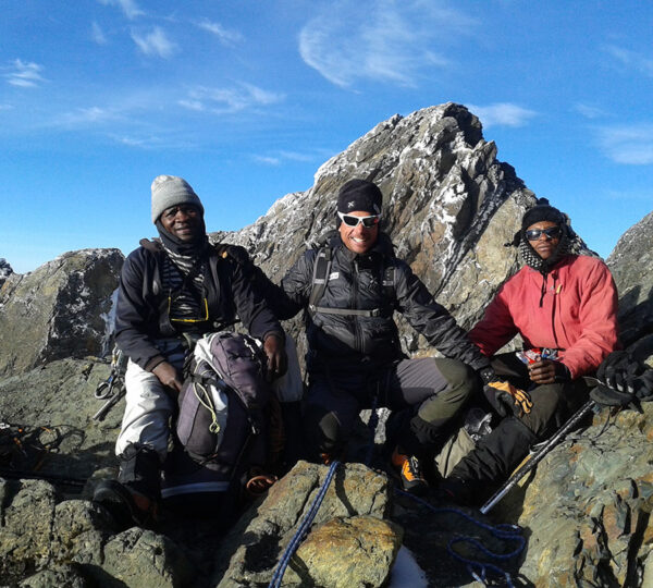 Climbers on Margherita Peak on Mountain Rwenzori in Rwenzori National Park